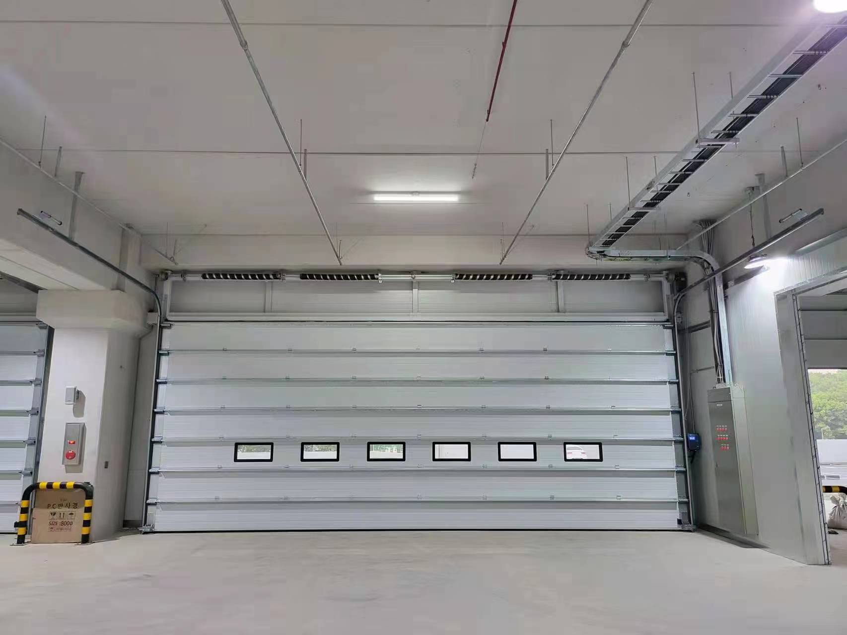 Pourquoi une porte sectionnelle peut-elle résoudre plus que de simples problèmes d’accès ?